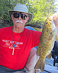 Trophy Smallmouth Bass Fishing By Ed in Canada